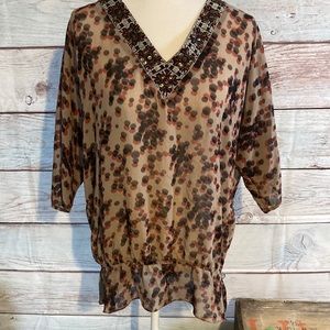 XL V neck semi sheer blouse. Has sequins and beads around neckline. Blou…